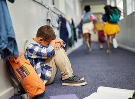 Normal_schoolboy-crying-on-floor-after-suffering-an-act-o-2025-01-09-18-39-20-utc